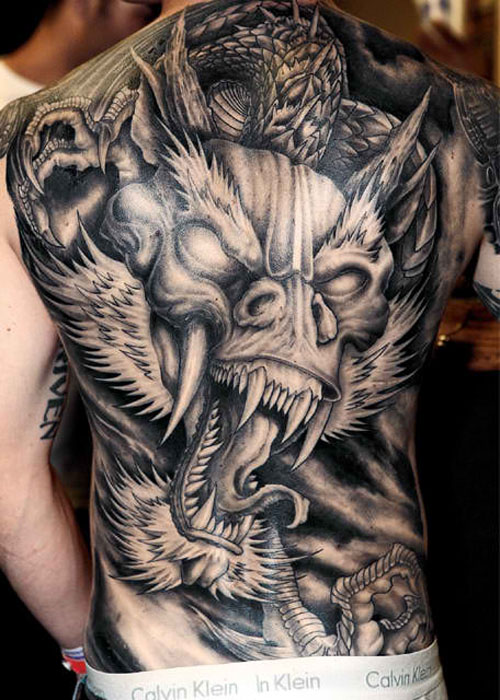 3d Evil looking wolf tattoo on back