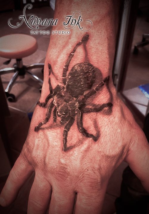 Amazing 3D Brazilian black tarantula tattoo on hand