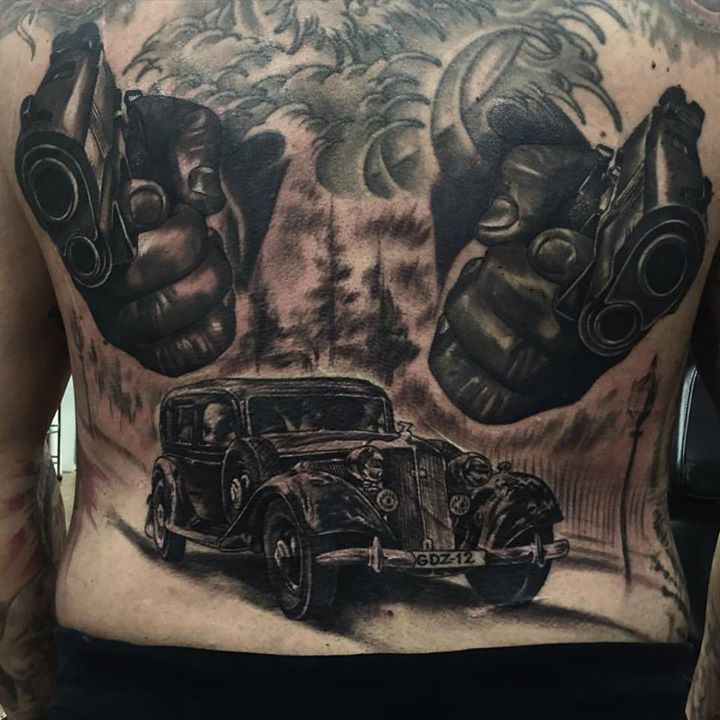 Amazing Pistol and Car Tattoo Done by Artby Adem at Fat Fugu Tattoo Studio with radiant colors ink - killerinktattoo