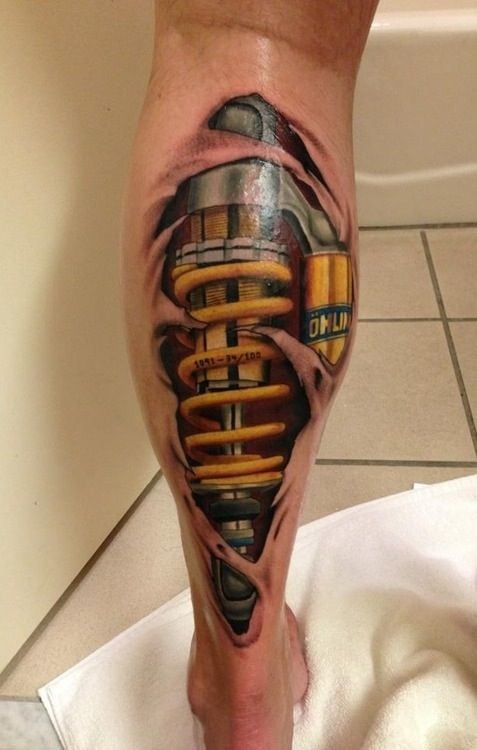 Amazing Shock Absorber Tattoo On Left Leg