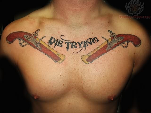 Antique Pistols With Text Die Trying Tattoo On Chest