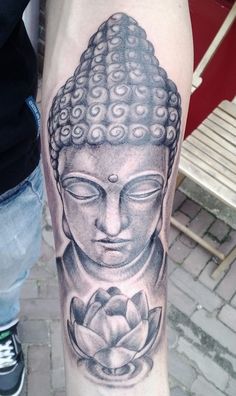 Beautiful Buddha tattoo with lotus by Sean Welsh