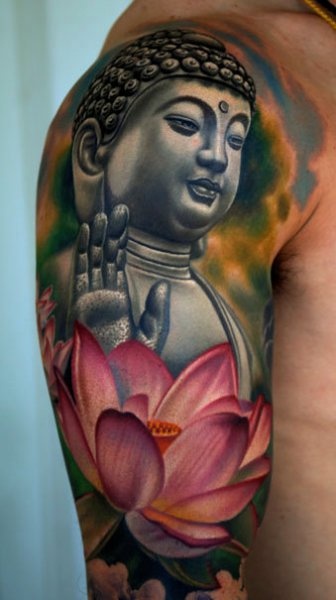 Beautiful Buddha with Lotus tattoo on shoulder