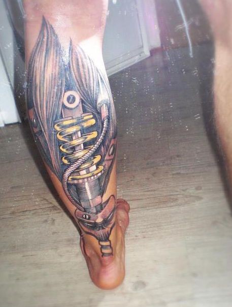 Biomechanical Shock Absorber tattoo on Left Leg
