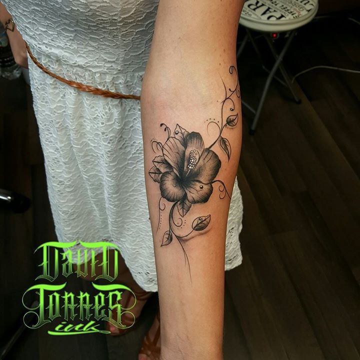 Black Ink Hibiscus Tattoo On Forearm by David Torres