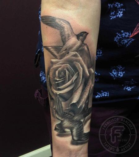 Black and grey bird with rose tattoo by Francisco Sanchez