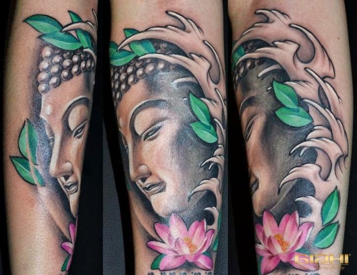 Black & whte buddha with pink lotus & green leaves tattoo on arm by Giahi