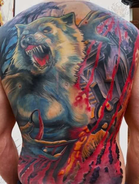 Colorful - Wild and cruel wolf tattoo on back representing wildness