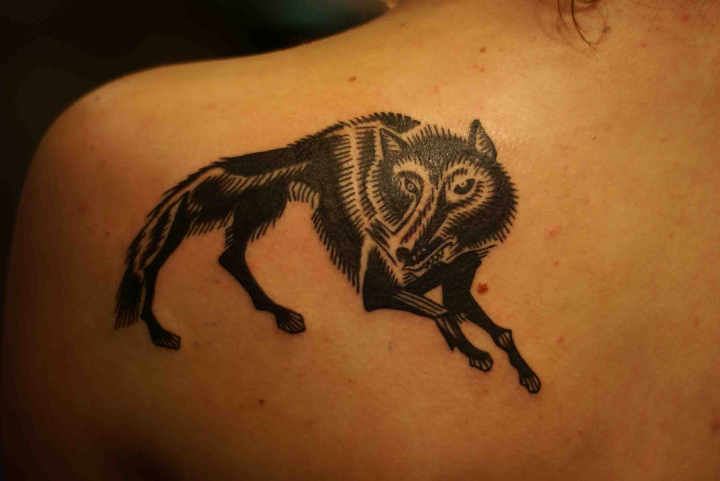 Dark Wolf Tattoo On Upper Back