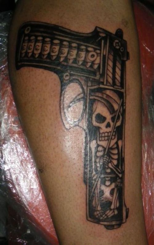 Death in pistol - Human Skelton on Pistol Barrel Tattoo