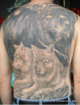 Father Wolf Tattoo on back by DARRIN WHITE  representing family
