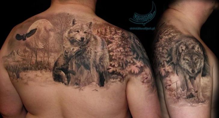 Lovely wolves and wildlife tattoo on back and shoulder representing family love and affection by Bloody Art