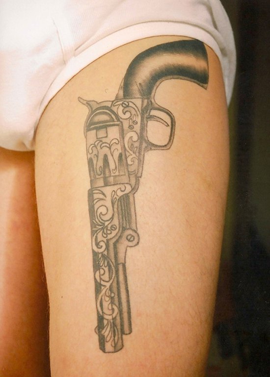 Old Gun Tattoo on Thigh