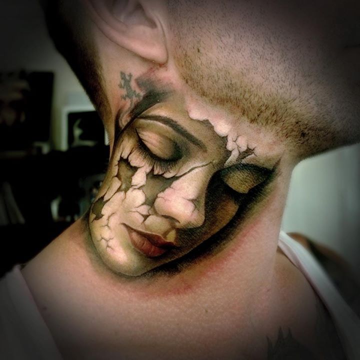 Ripped skin girl's face tattoo on neck by Sam Barber