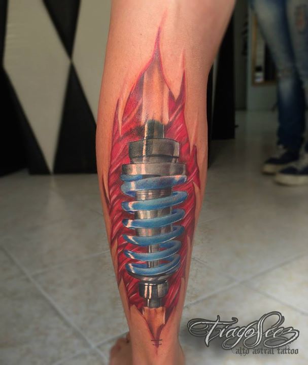 Shock Absorber Fitted In Leg Tattoo By Tiago Siez at Alto Astral Tattoo Studio Portugal