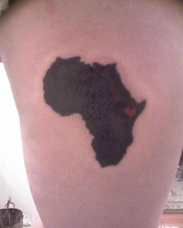 Small Black Ink African Map Tattoo on Thigh