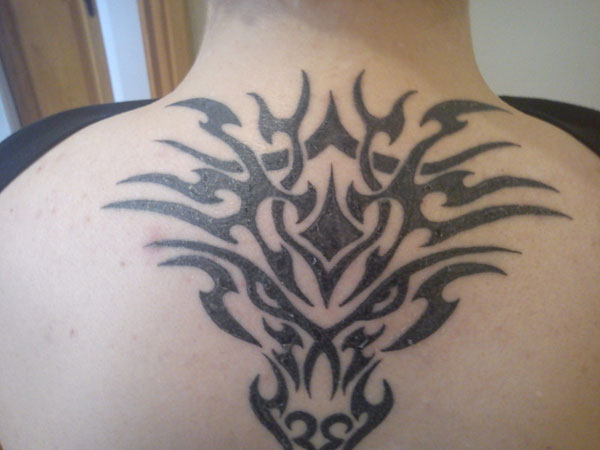 Tribal Wolf's Face Tattoo on Back
