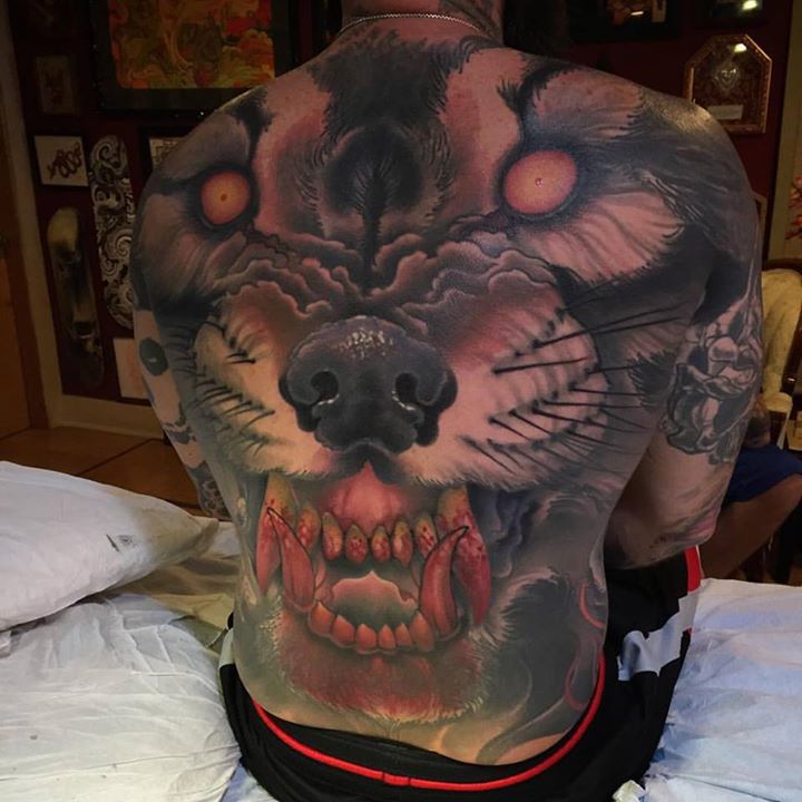 Wild wolf tattoo on back by Jeff Gogue (3 cover ups)