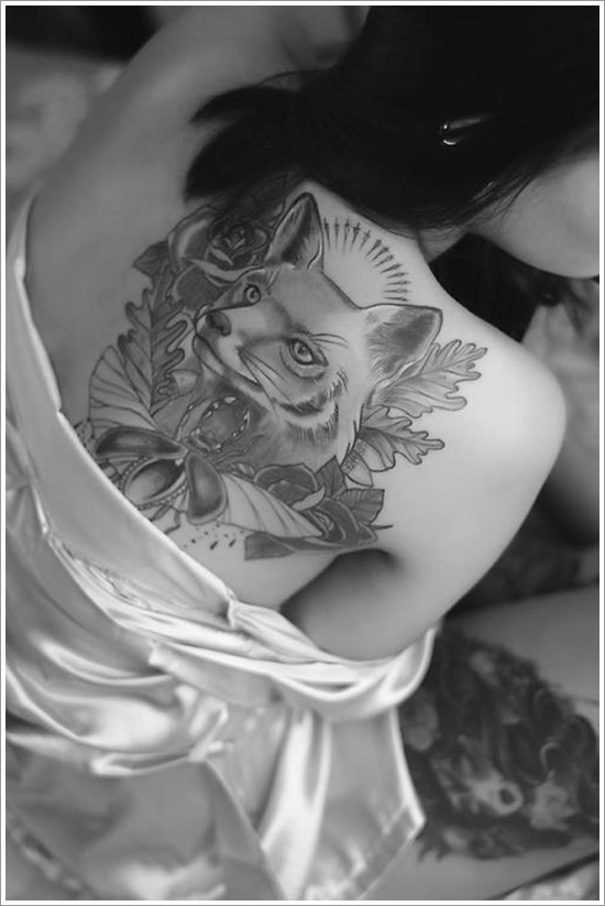 Wolf in leaves Black & white tattoo on back