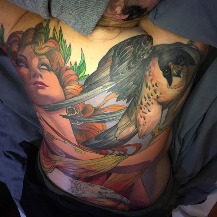 Amazing colorful back tattoo by Jeff gogue
