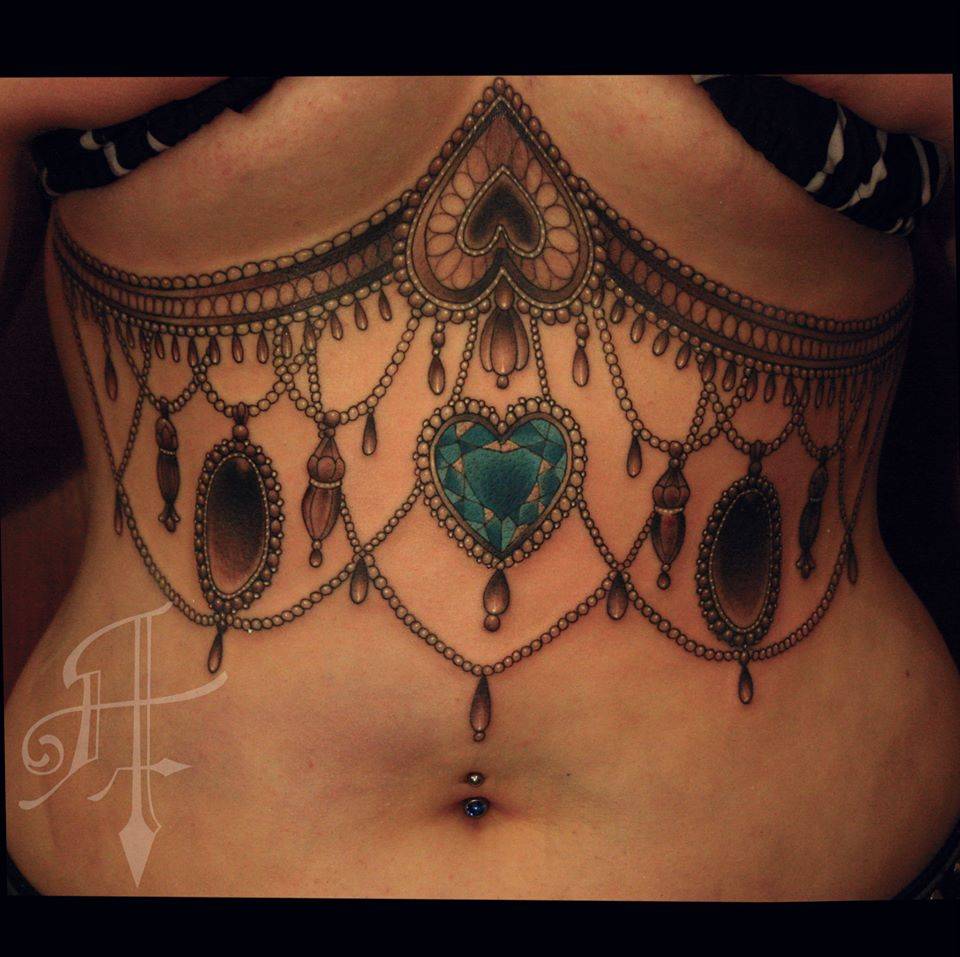 Awesome Jewel Tattoo on Under Breast by Anthony Flemming
