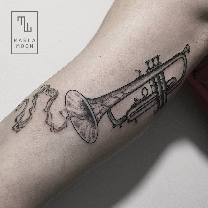 Awesome Trumpet Tattoo on bicep by Marla Moon