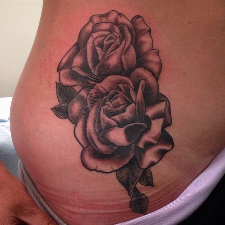 Black Rose tattoo on hip by Dragon Fx
