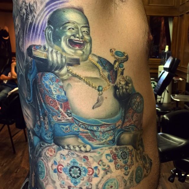 Colorful Laughing Buddha Tattoo by Rember orellana