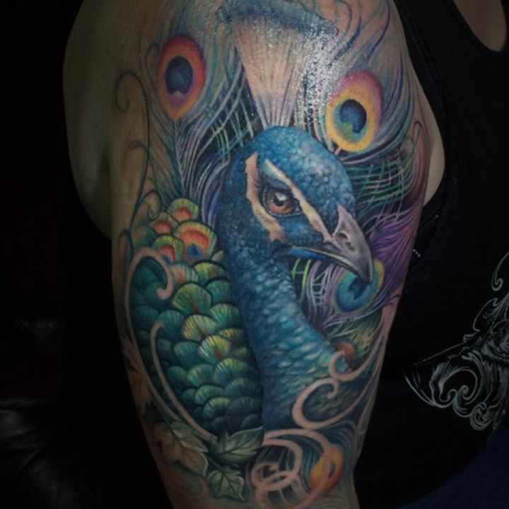 Colorful peacock tattoo by Samm Lacey