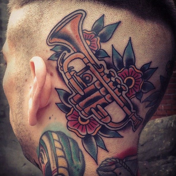Colorful trumpet with flowers tattoo on back neck & head
