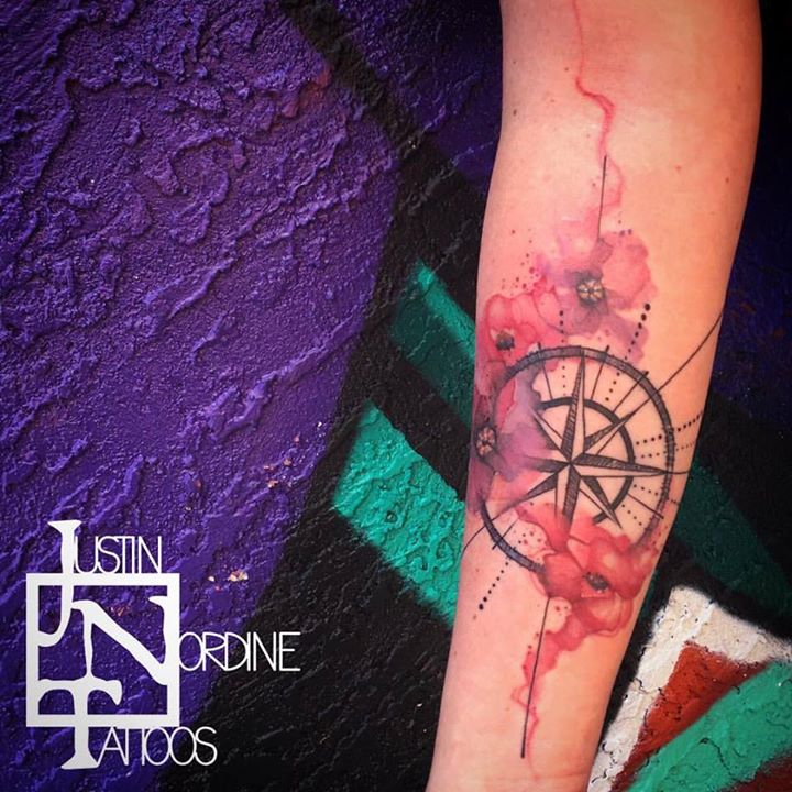 Compass & poppies tattoo on arm by Justin Nordine