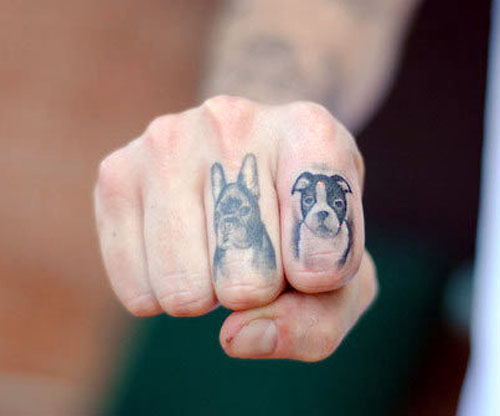 Dog and puppy tattoo on fingers