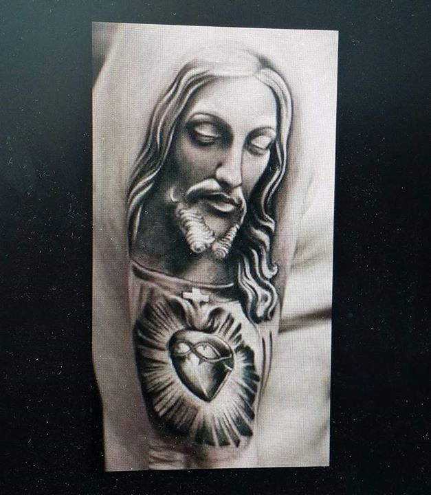 Jesus Christ tattoo on arm