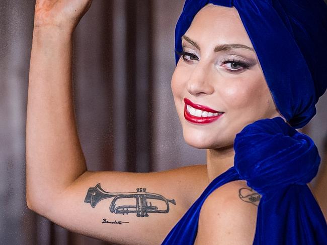 Lady Gaga's Trumpet Tattoo on Bicep