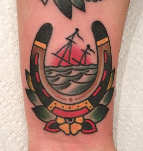 Sinking Ship And Horseshoe Traditional Tattoo