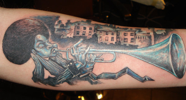 Trumpet man tattoo on forearm by bobross2
