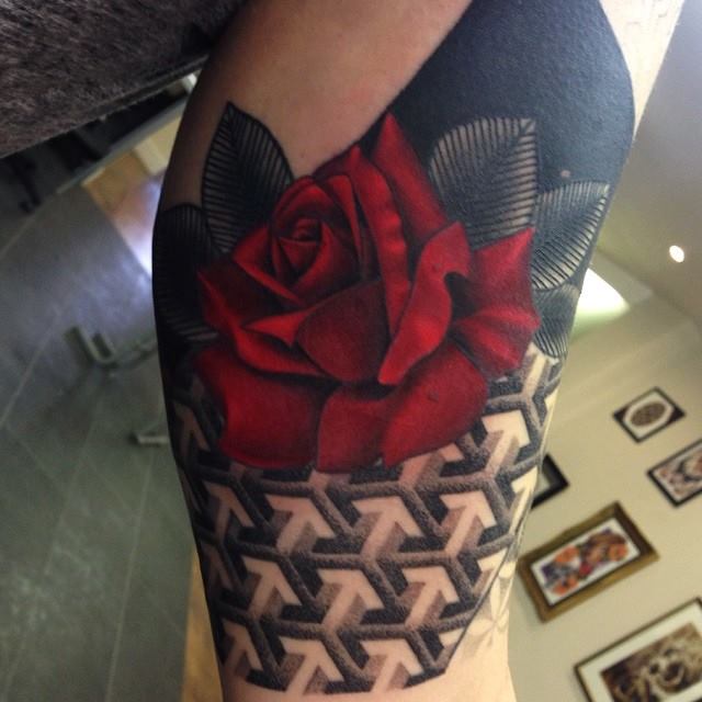 Awesome red rose tattoo on sleeve