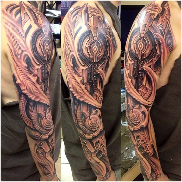 Biomechanical Tattoo On Full Sleeve by Roman Abrego