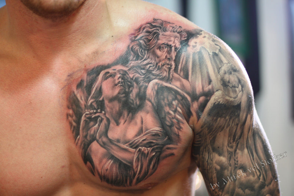Black and grey angel tattoo on chest and shoulder by Mirek vel Stotker