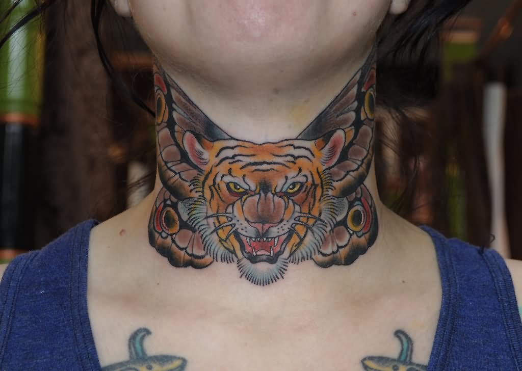 Butterfly wings with tiger at center neck tattoo by Ryan Mason