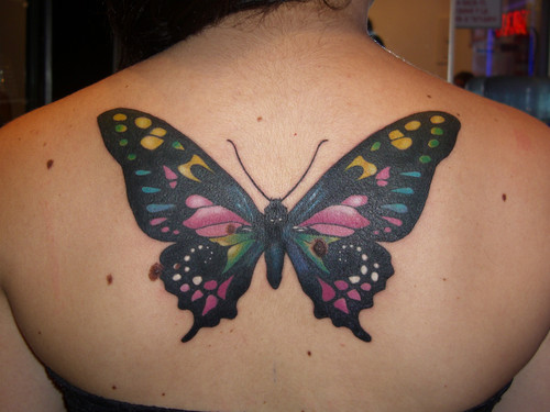 Colorful Mariposa Tattoo On Upper Back