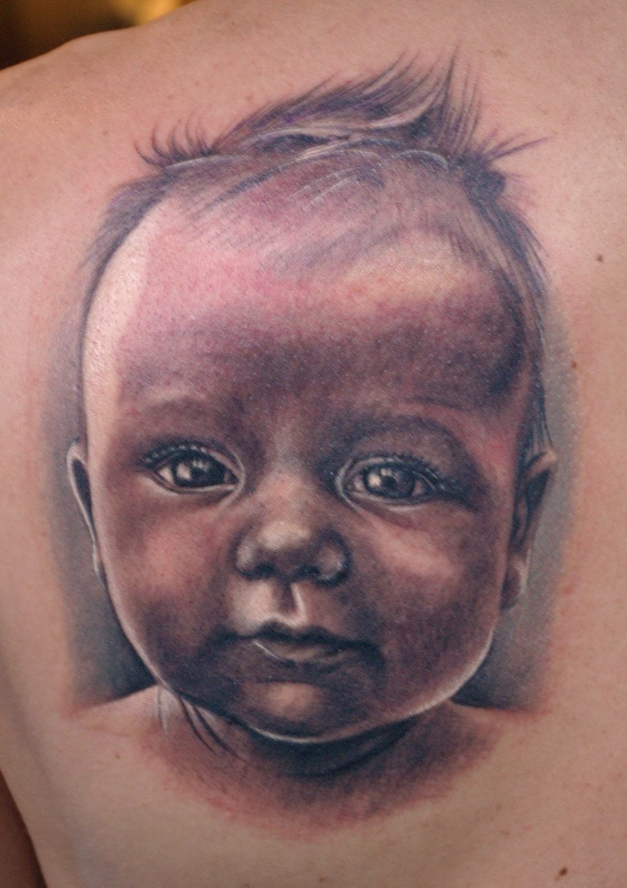 Cute Baby Portrait Tattoo On Back