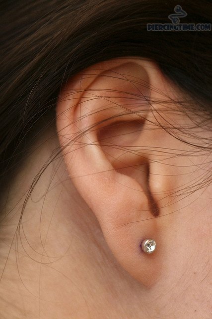Ear Lobe Piercing With Diamond Stud