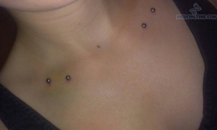 Girl With Silver Barbell Surface Clavicle Piercing