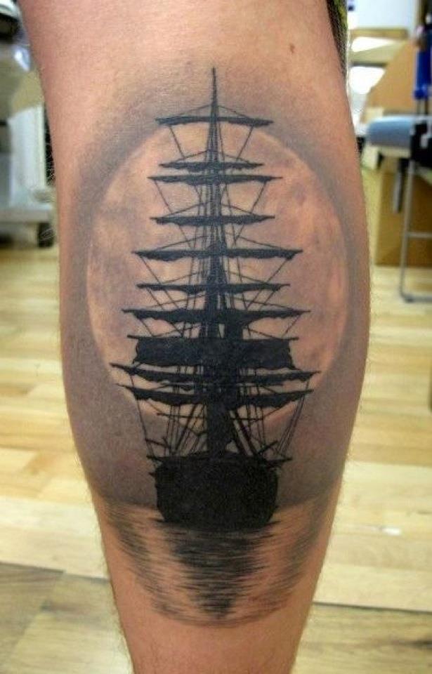 Grey And Black Ink Boat Tattoo On Back Leg Calf