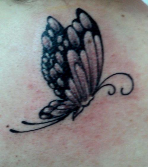 Grey Ink Mariposa Tattoo Design Closeup Image