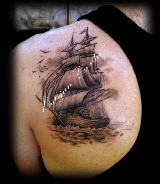 Incredible Sailboat Tattoo on Back Shoulder