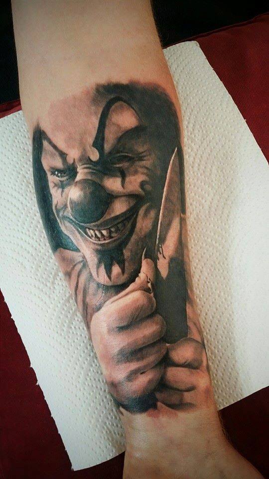 Laughing Clown Tattoo On Arm by Jarrad Johl