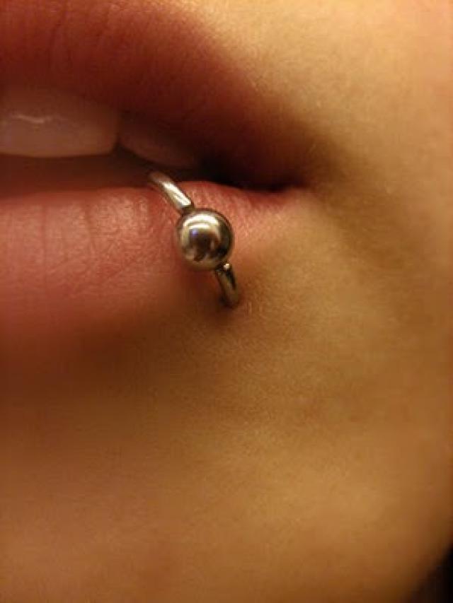 Lip Piercing With Silver Bead Ring