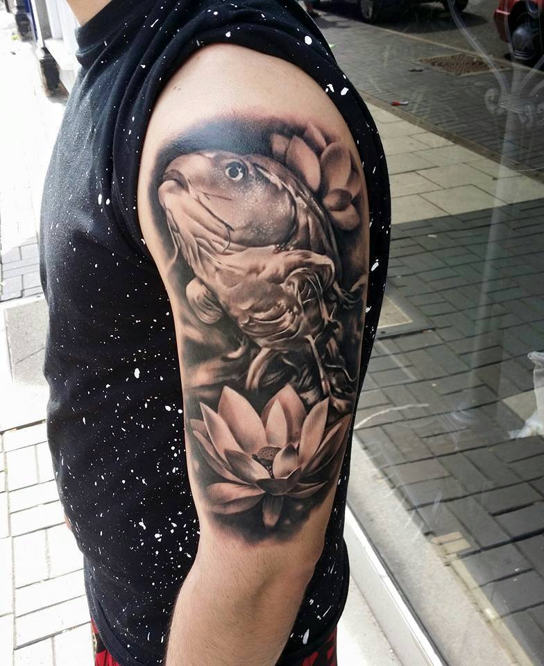 Lotus Flowers And Fish Tattoo On Left Half Sleeve by Fanel Alexe